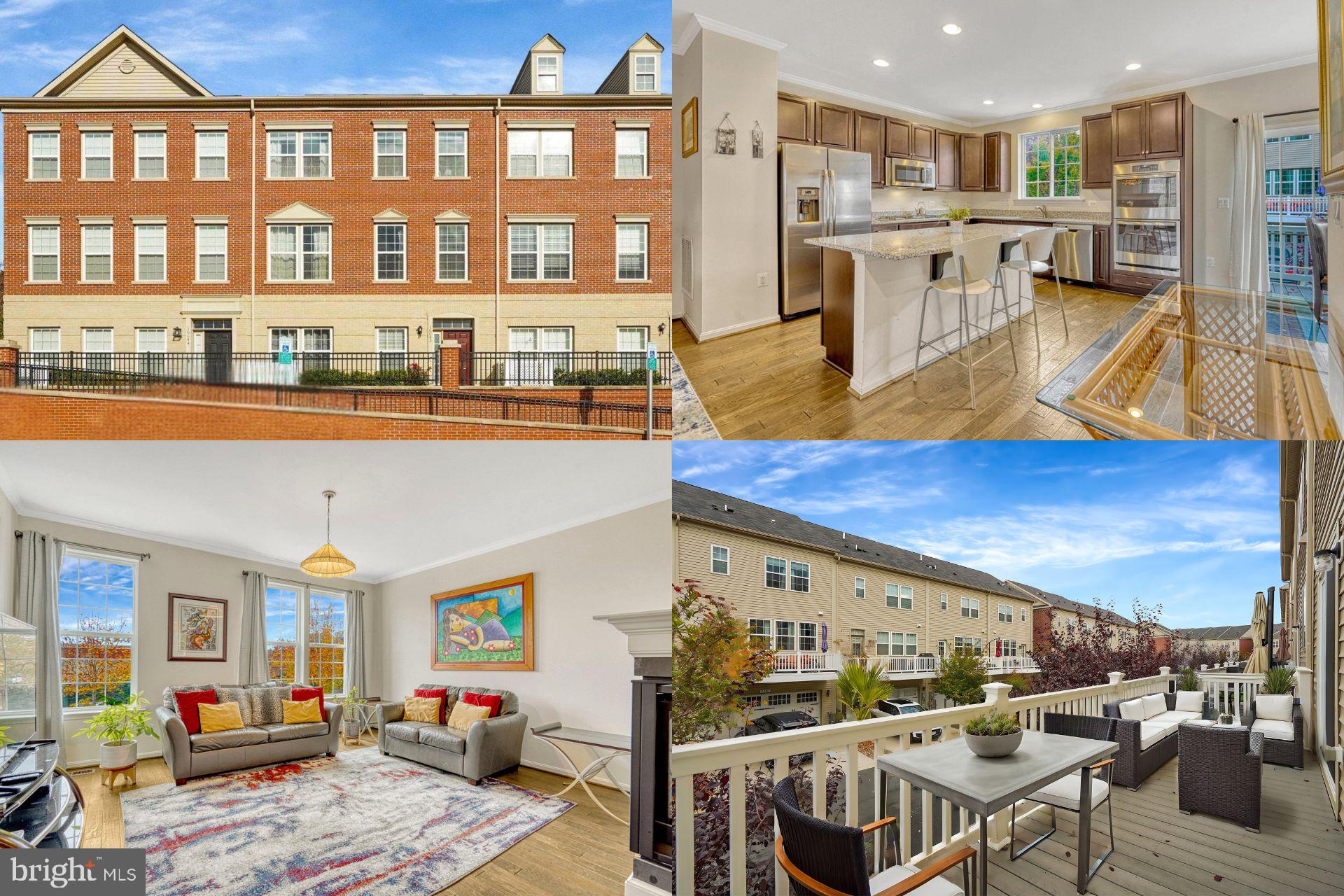 a living room with stainless steel appliances kitchen island granite countertop a table chairs and a living room view