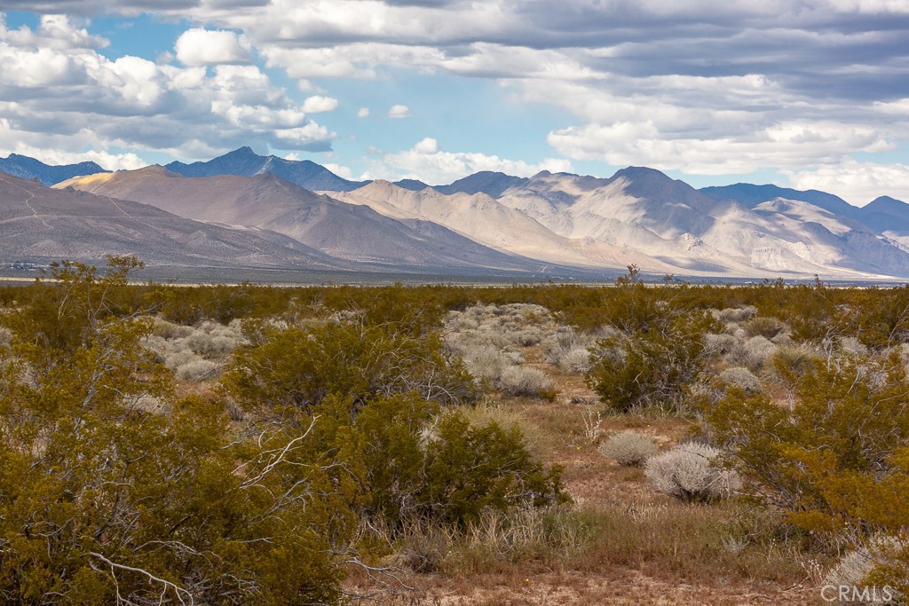 a view of an outdoor space with mountain view