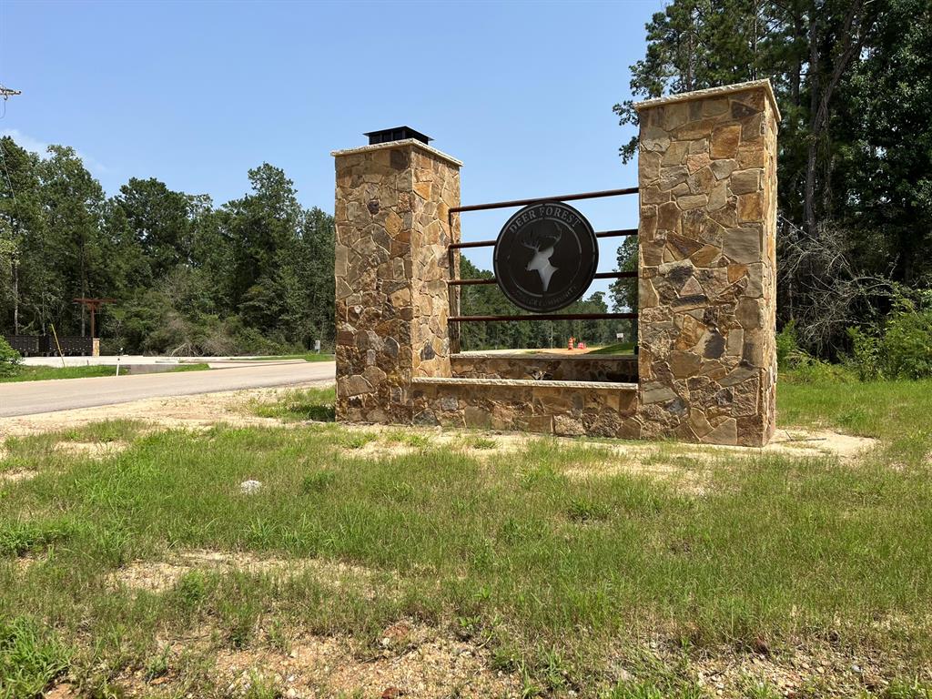 a backyard of a house with barbeque oven