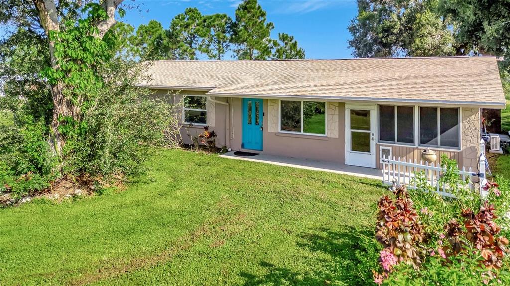 front view of a house with a yard