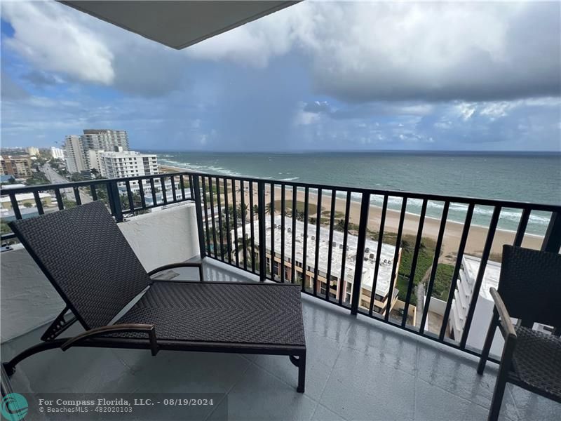 a view of a chairs in a balcony