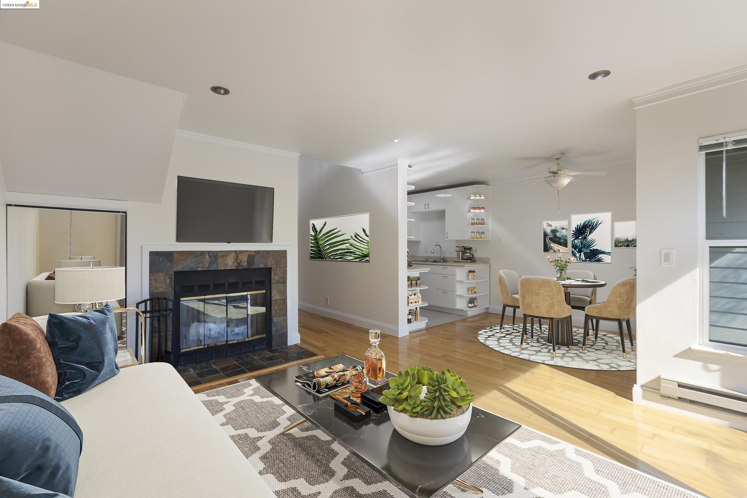 a living room with furniture fireplace and a potted plant