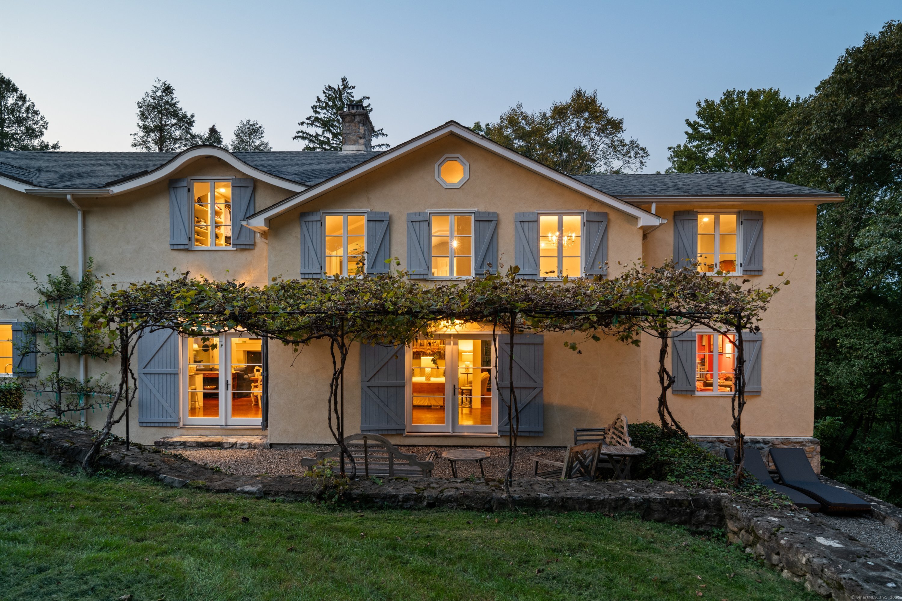 a front view of a house with garden