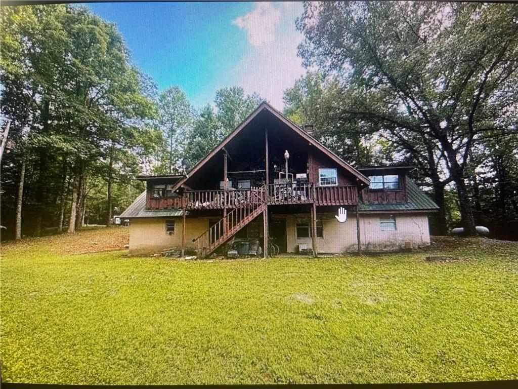 a view of a house with a swimming pool