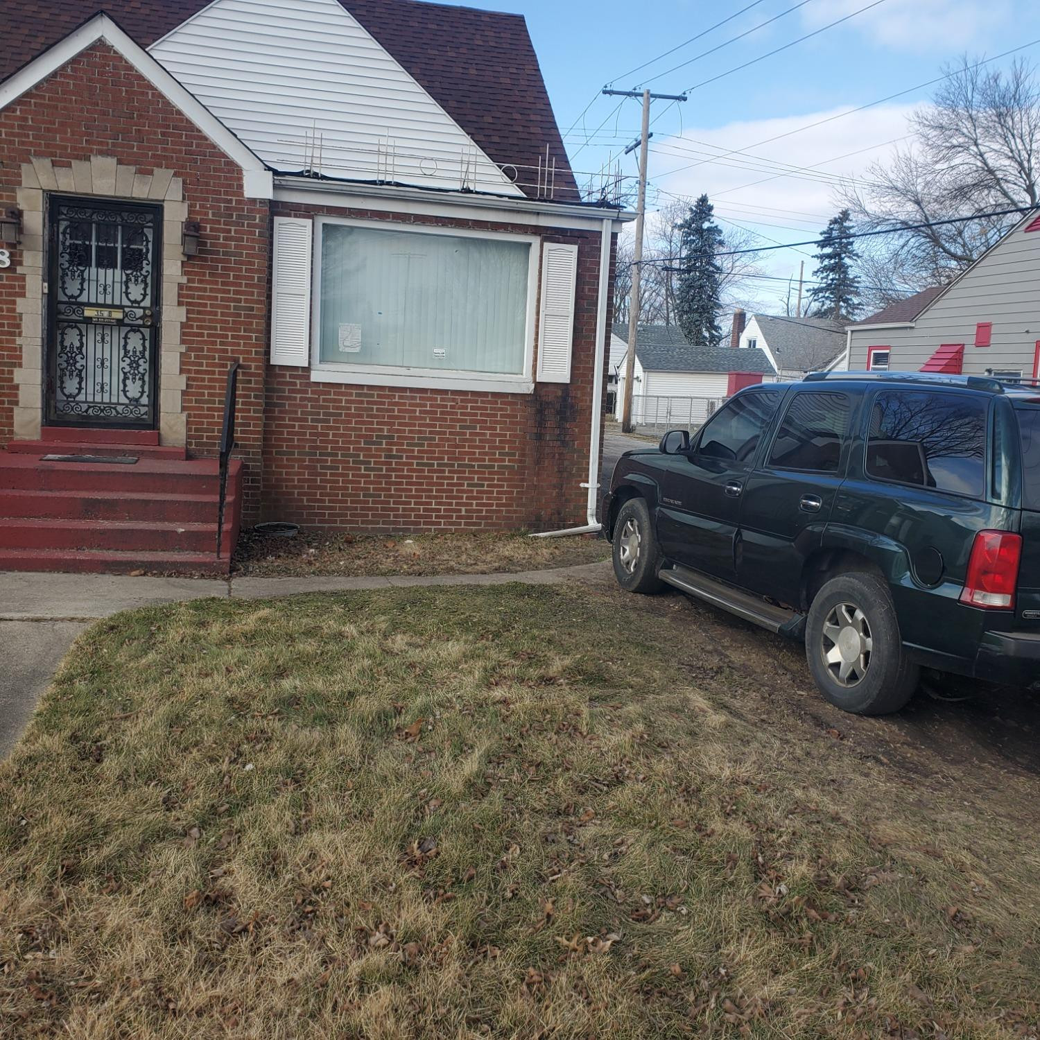 a view of a car in front of a house