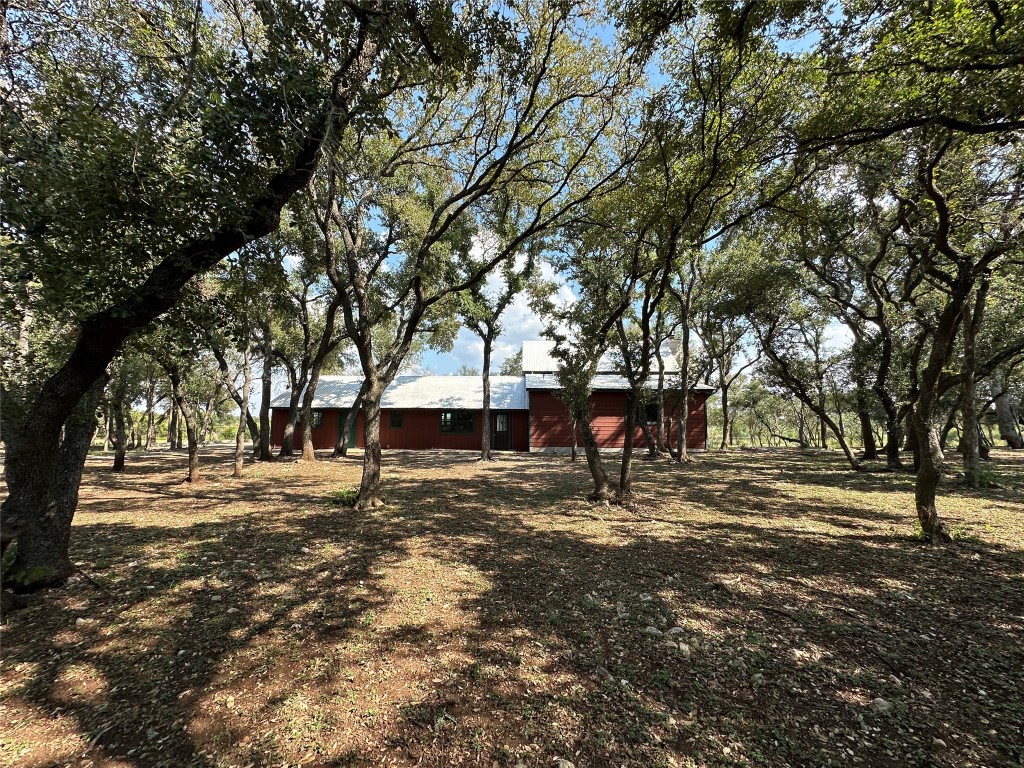 a house with trees in front of it