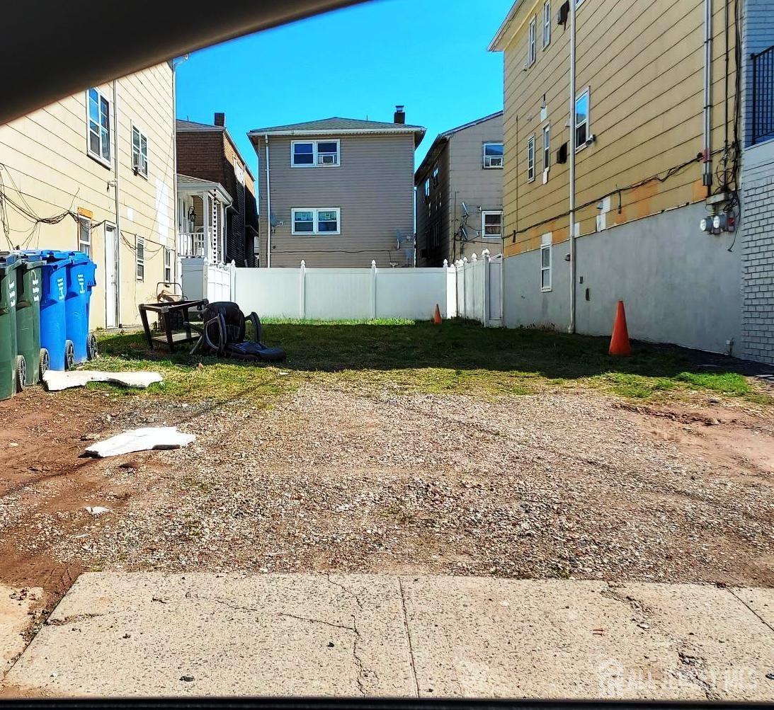 a view of a back yard of the house