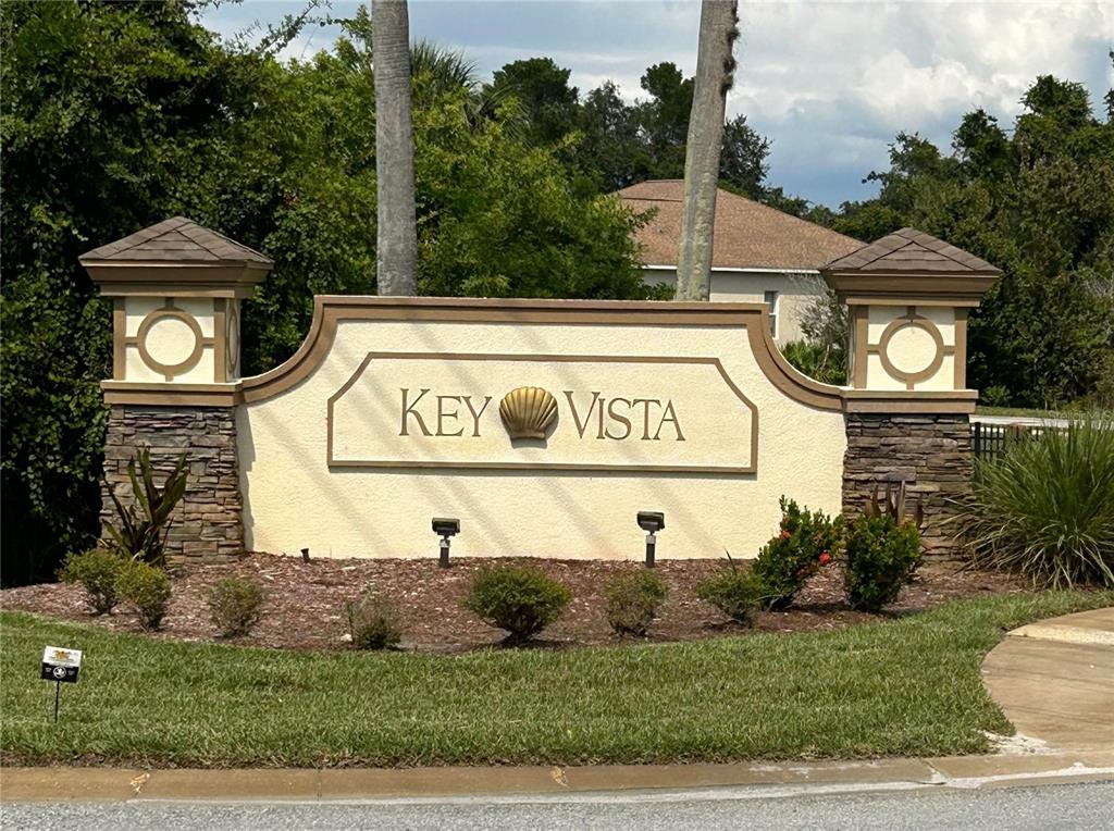 a view of a street sign on a small yard