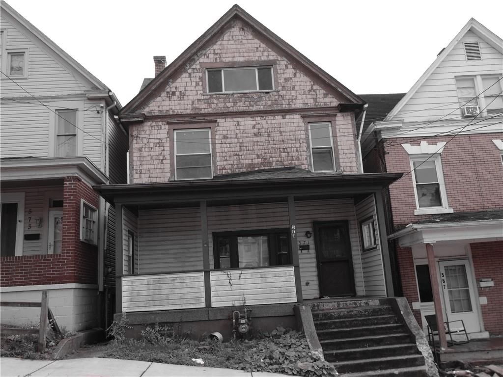 a front view of a house with a door