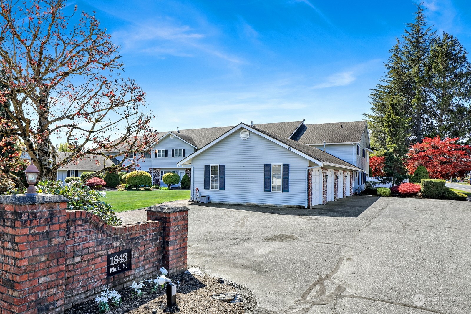 front view of a house with a yard