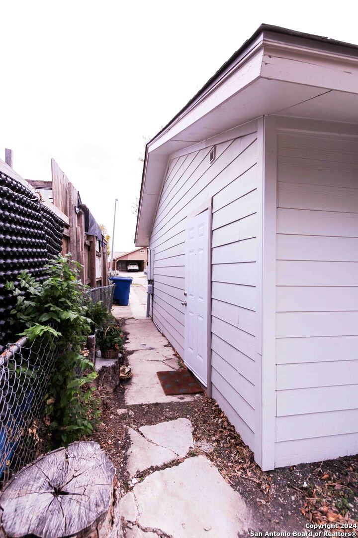 a view of a back yard of the house