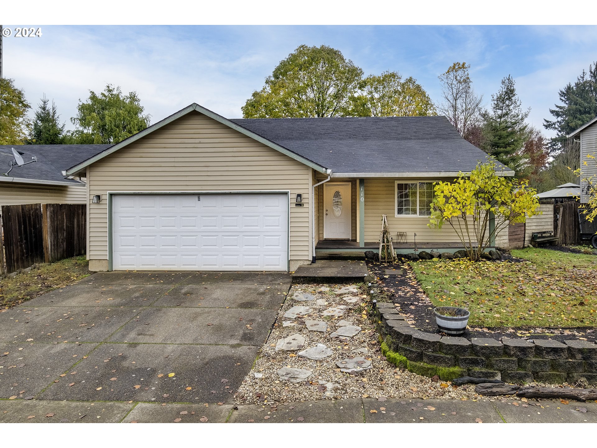 a house view with a garden space