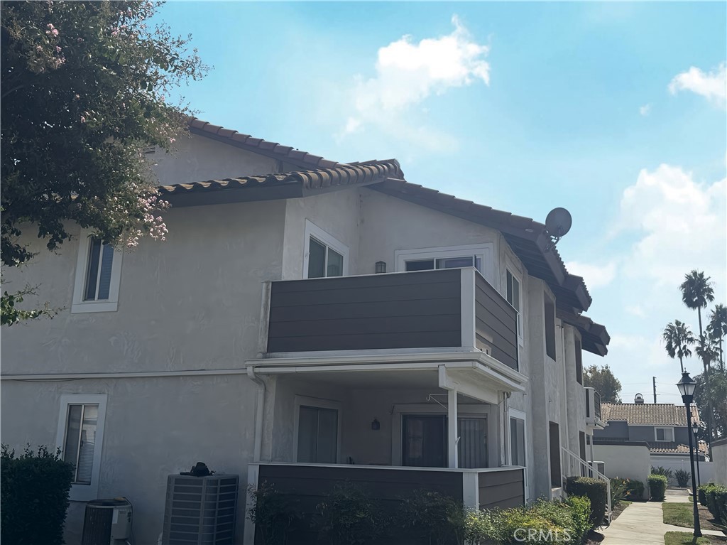 a view of a house with a street