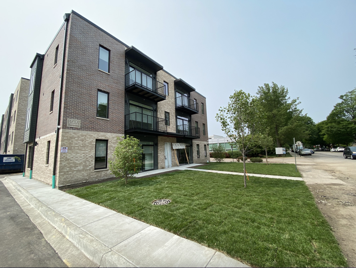 a view of building with yard