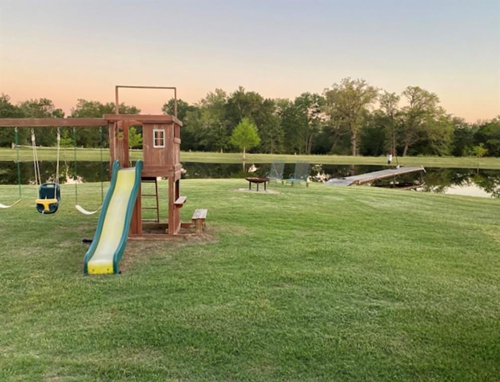 a view of a park with swings