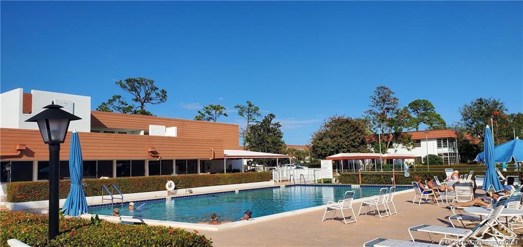 a view of a house with a swimming pool