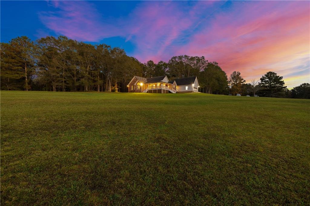 a view of a big yard of a house with a yard