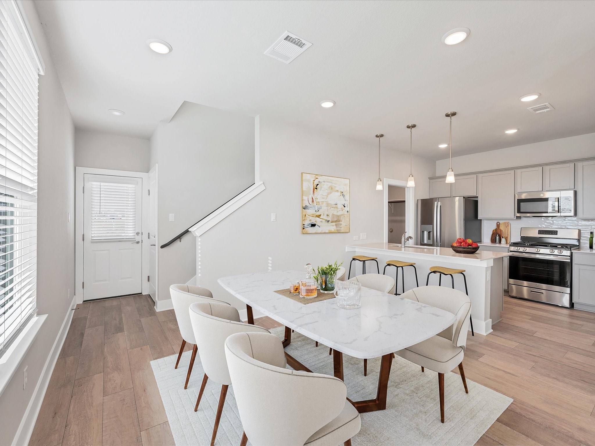 a view of kitchen with cabinets and wooden floor