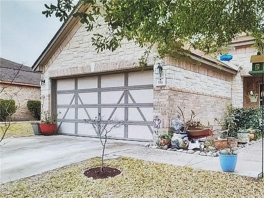 a house view with a outdoor space