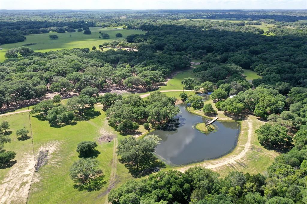 an aerial view of residential house with outdoor space