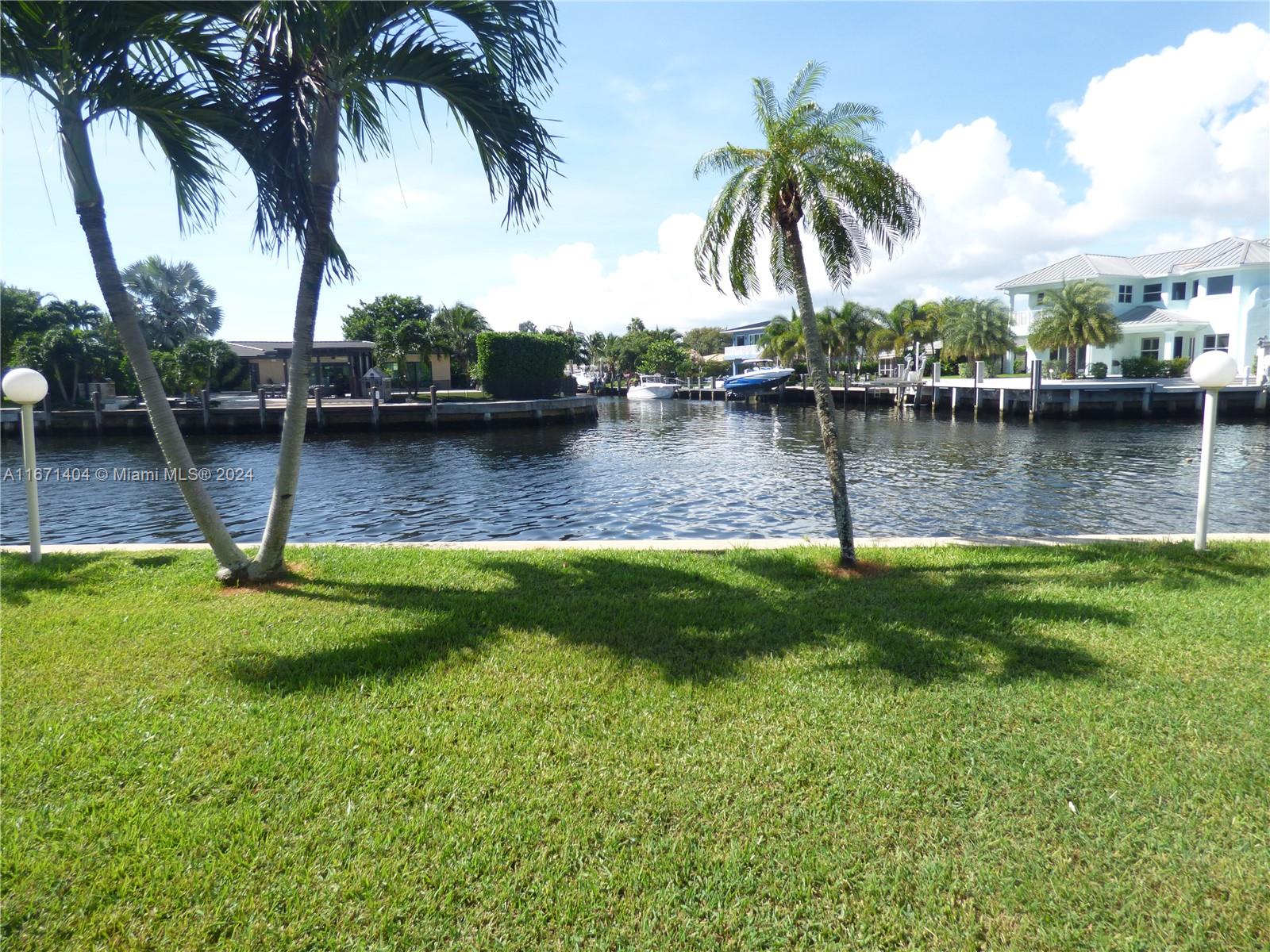 a view of a lake view with a garden