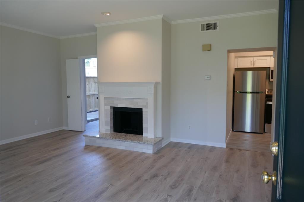 a view of a livingroom with a fireplace