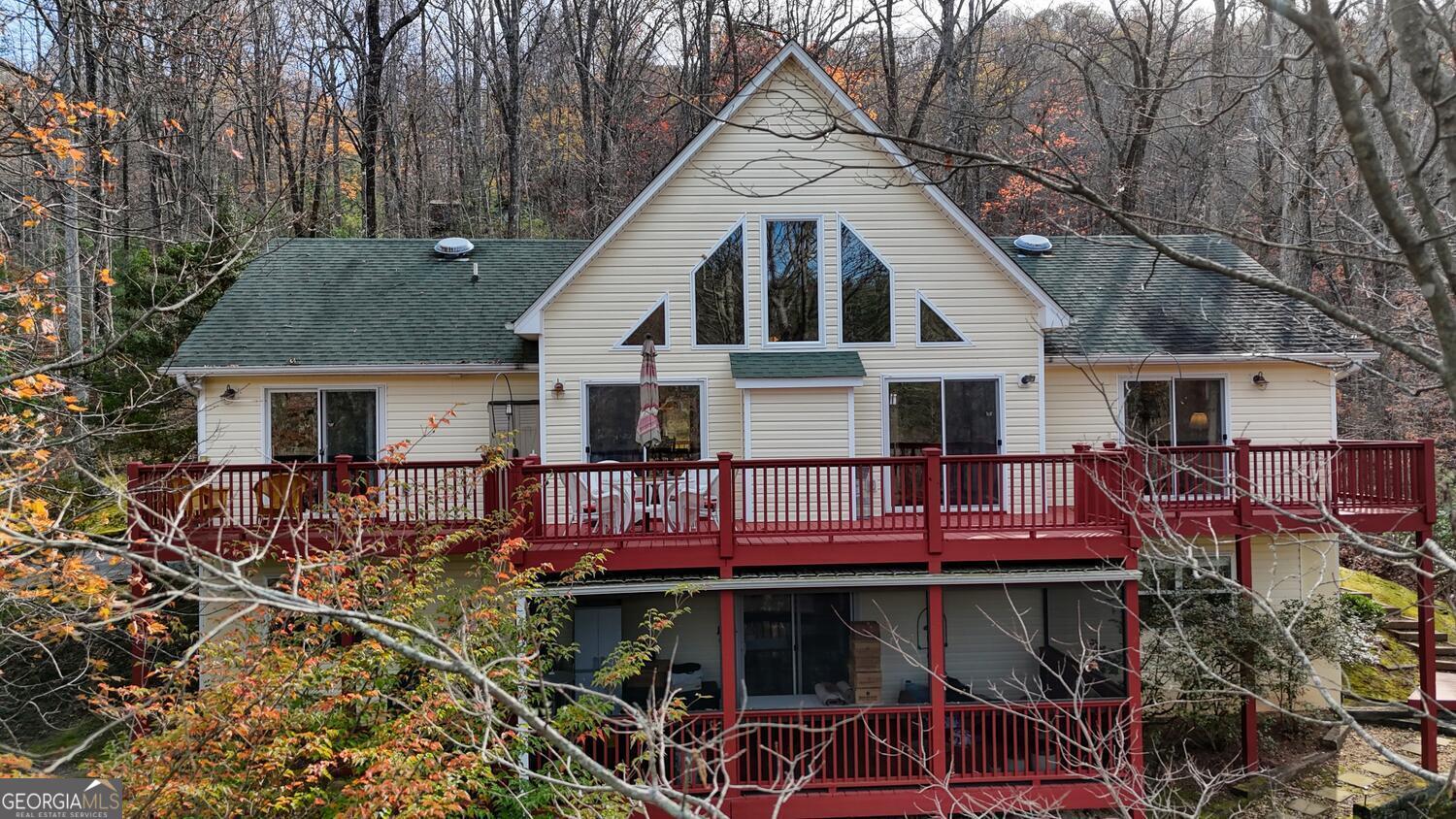 a view of house with outdoor seating