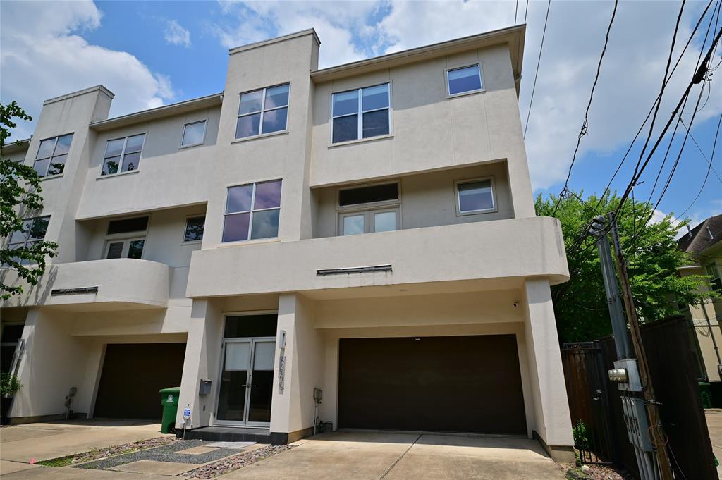 Contemporary corner townhouse with private guest parking. Prime location with easy access to downtown and freeways. One of three unique homes.