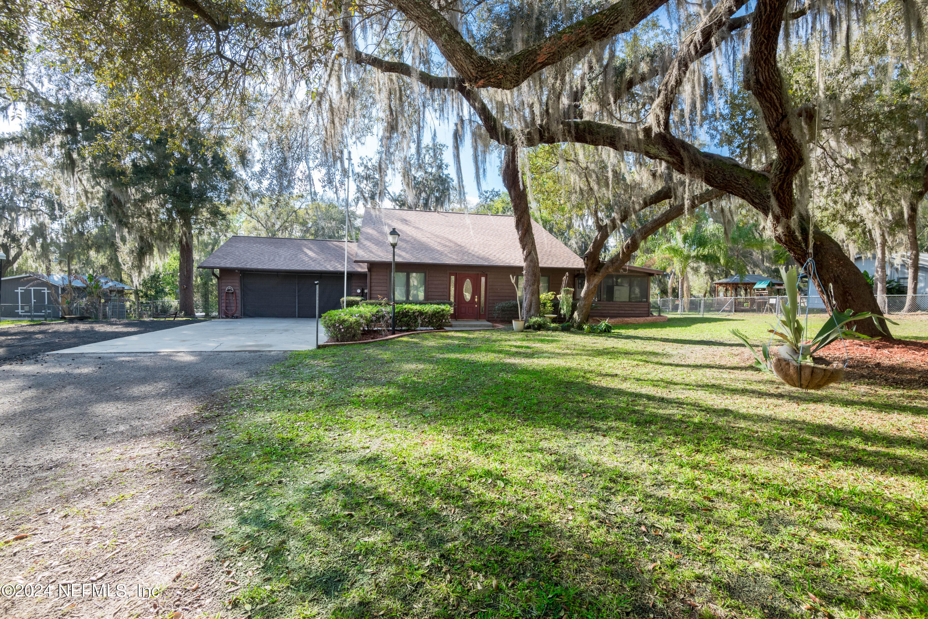 a view of house with yard