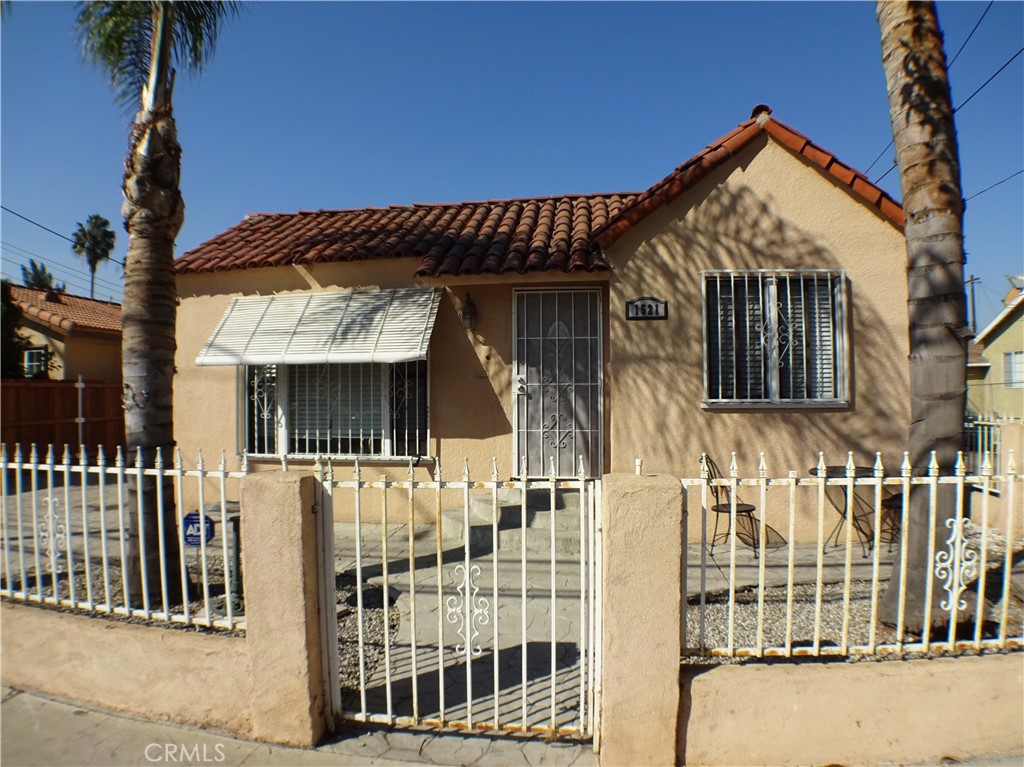 front view of a house with a small yard