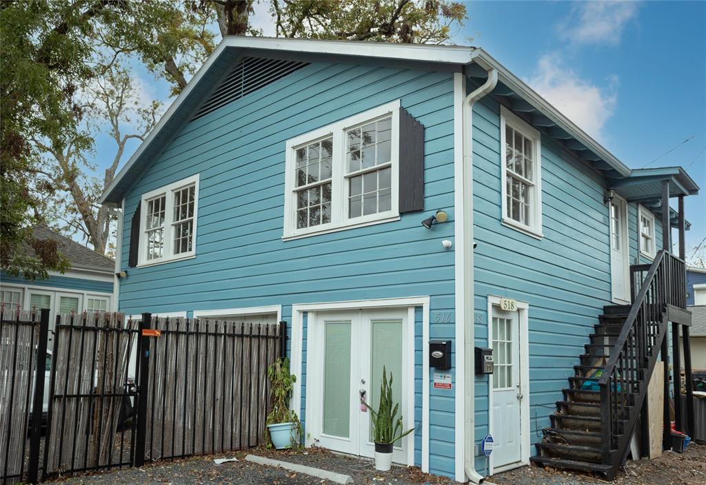 a front view of a house with garage