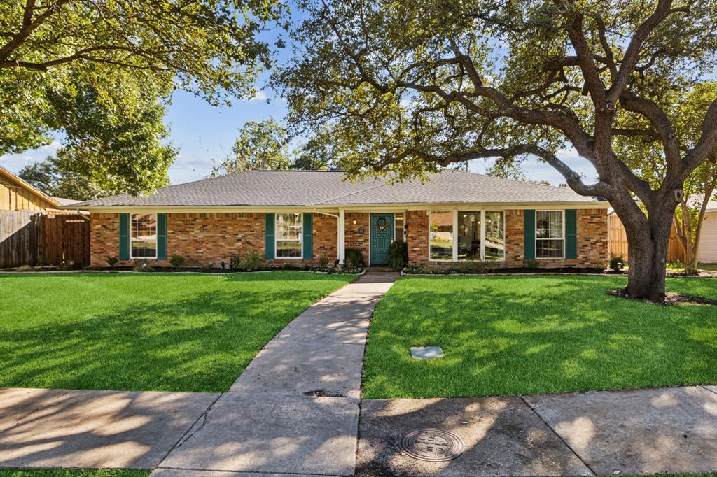 front view of a house and a yard