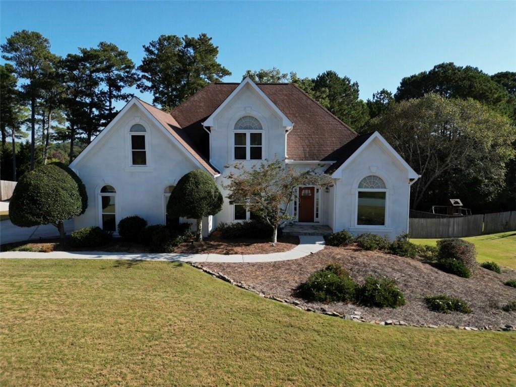 a house view with a outdoor space