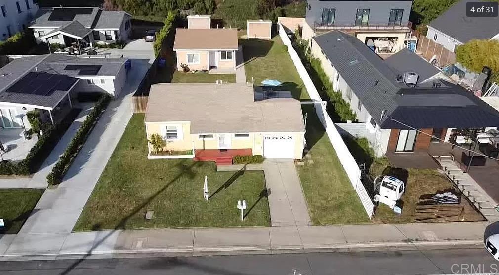 an aerial view of a highlighted house