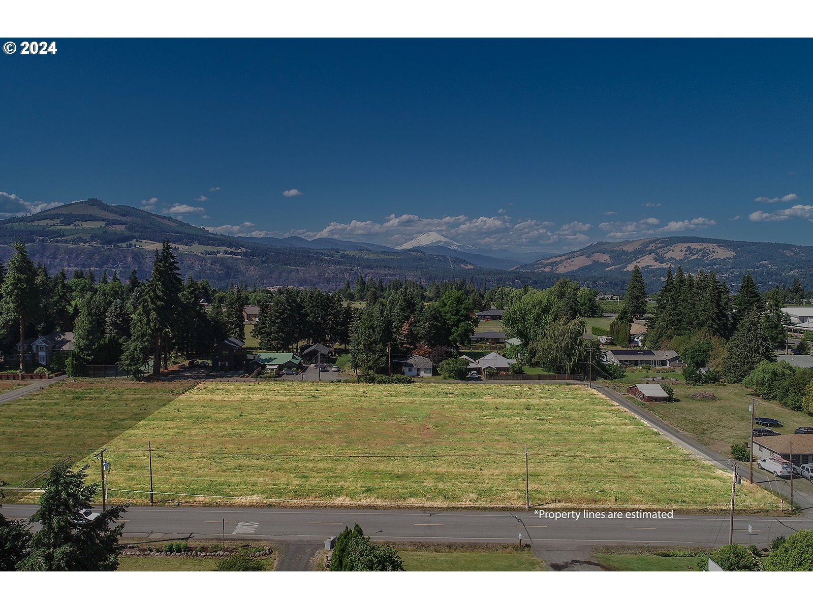 a view of an outdoor space yard ocean and mountain view