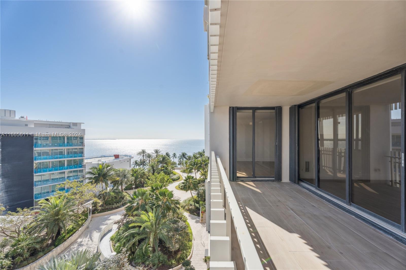 a balcony with view of outdoor space