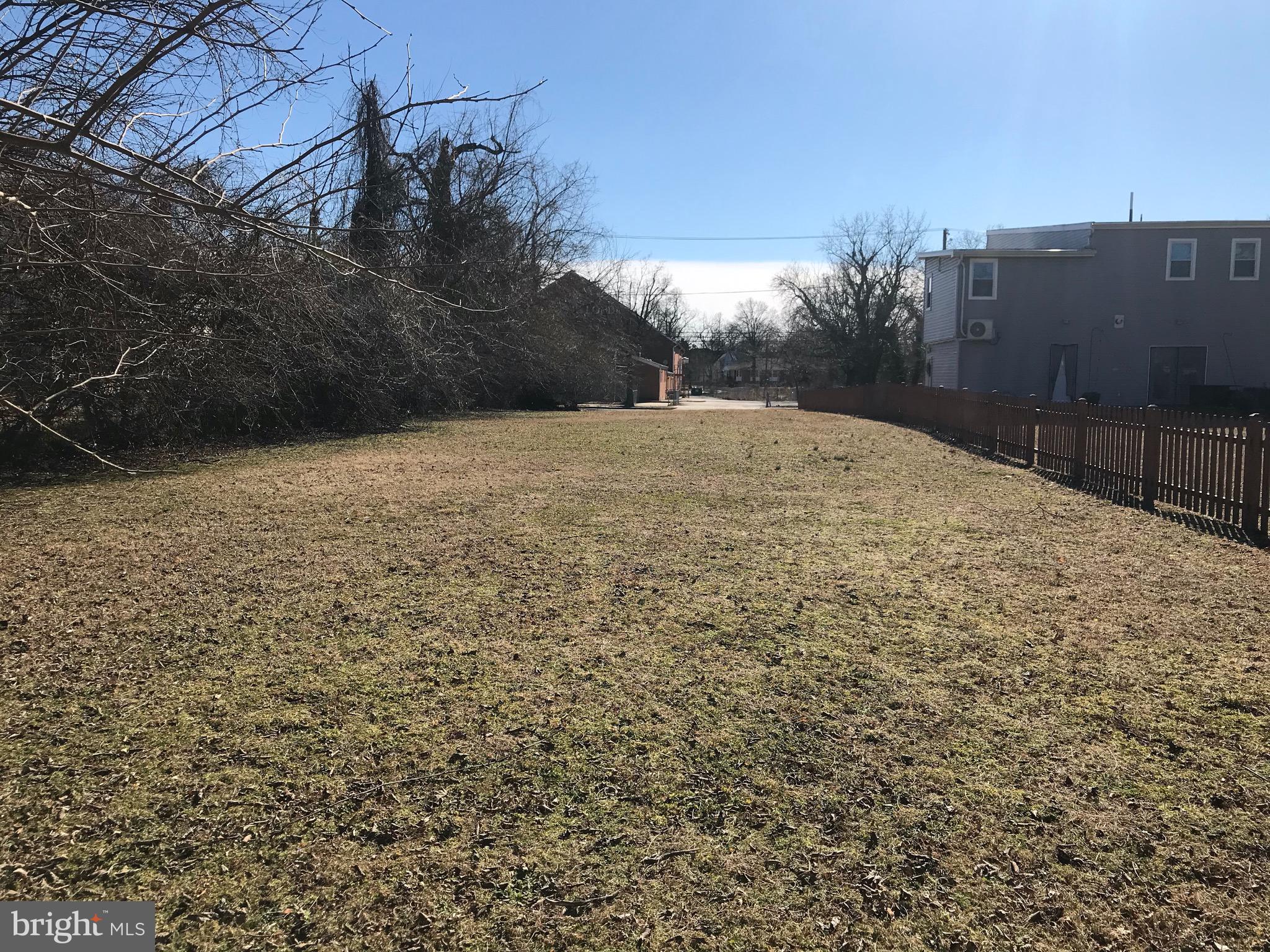 a view of a backyard of the house