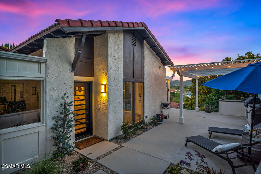 a view of a house with a patio