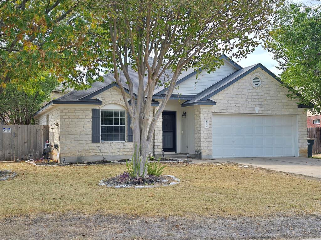 a front view of house with yard