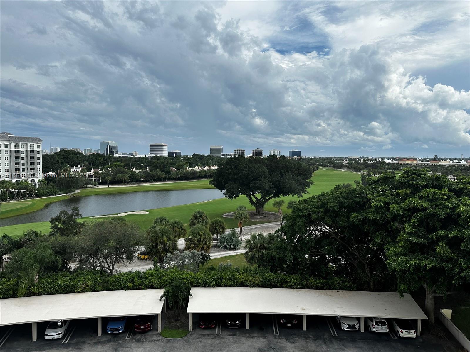 a view of a lake with a yard