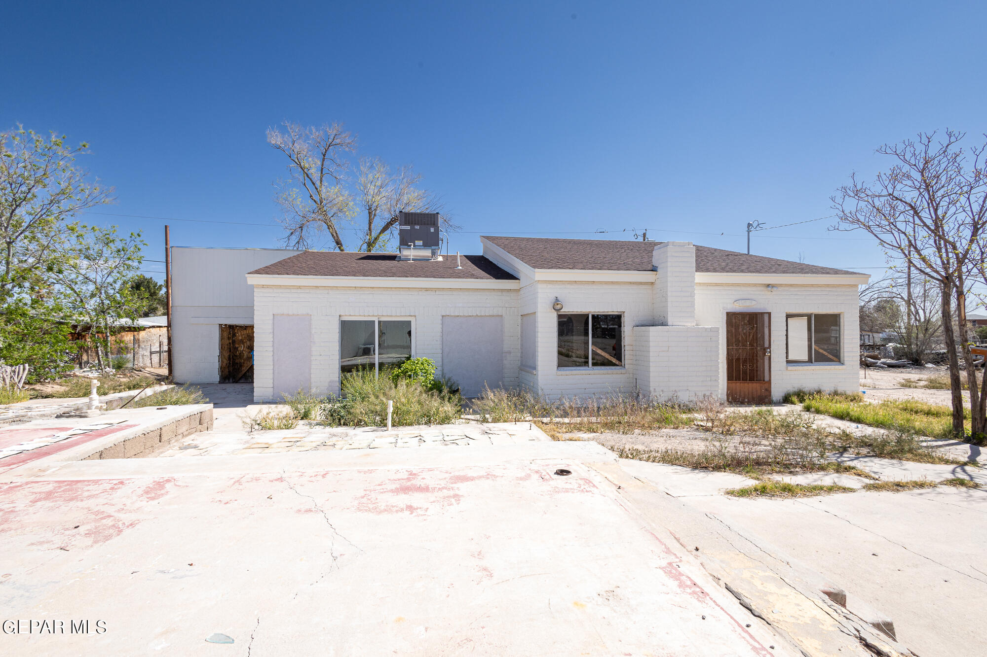 a front view of a house with a patio