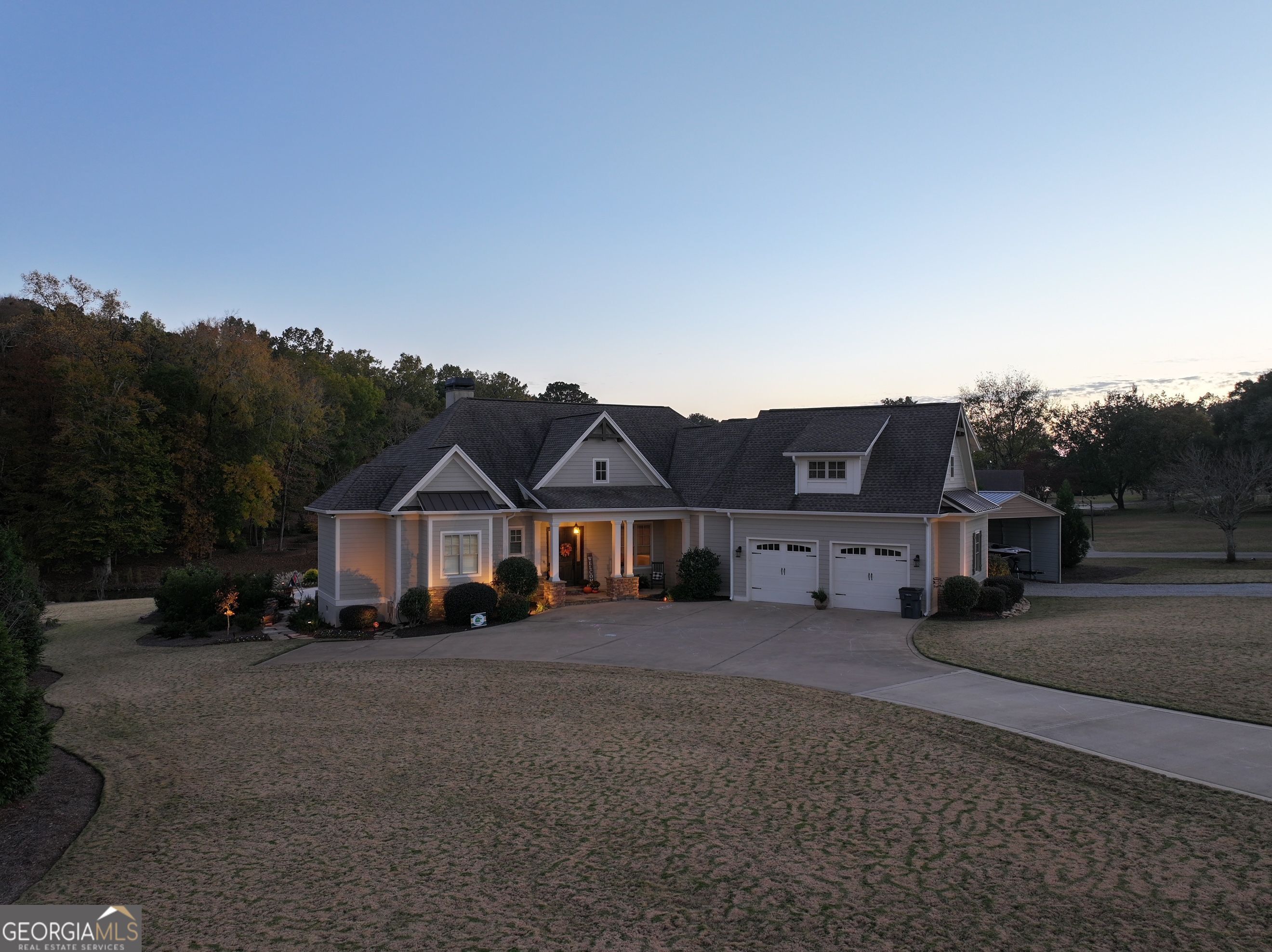 front view of a house with a yard