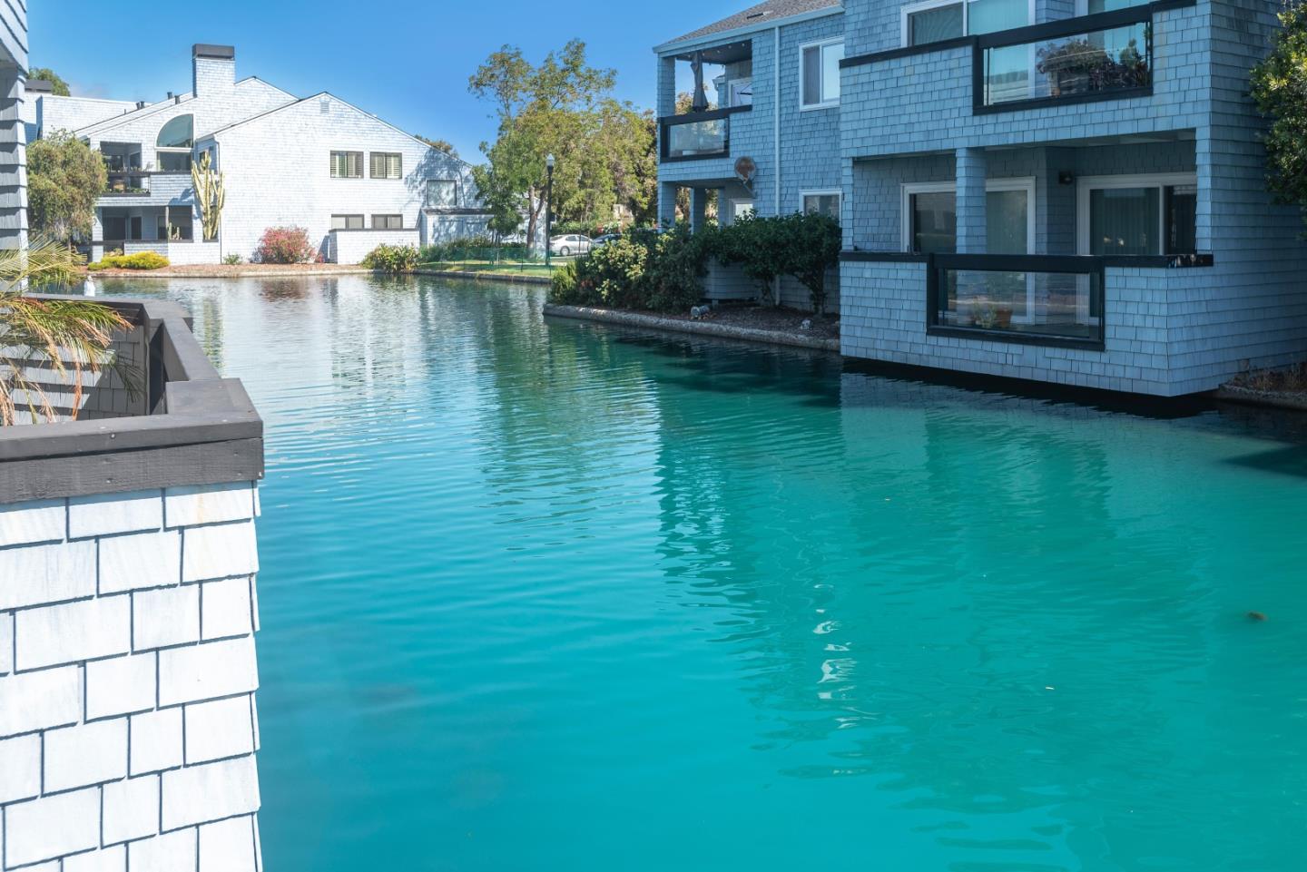 a view of a lake with a house