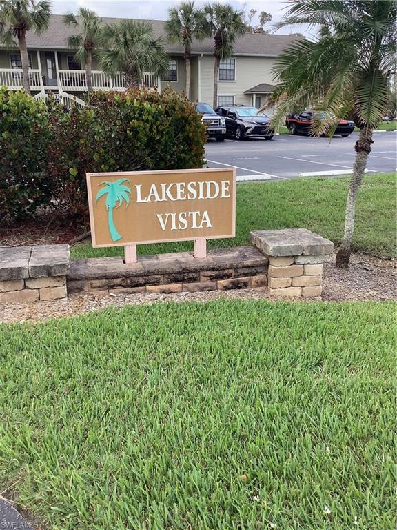 Community sign with a lawn