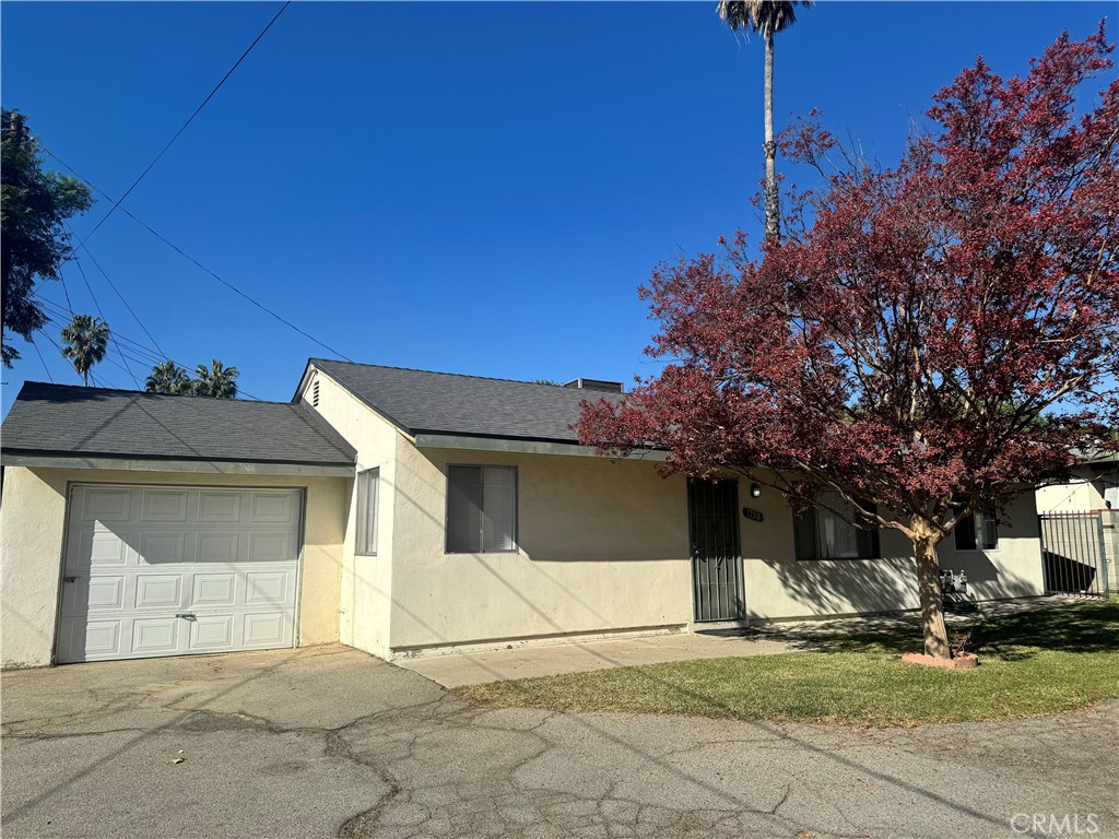 a house with trees in front of it