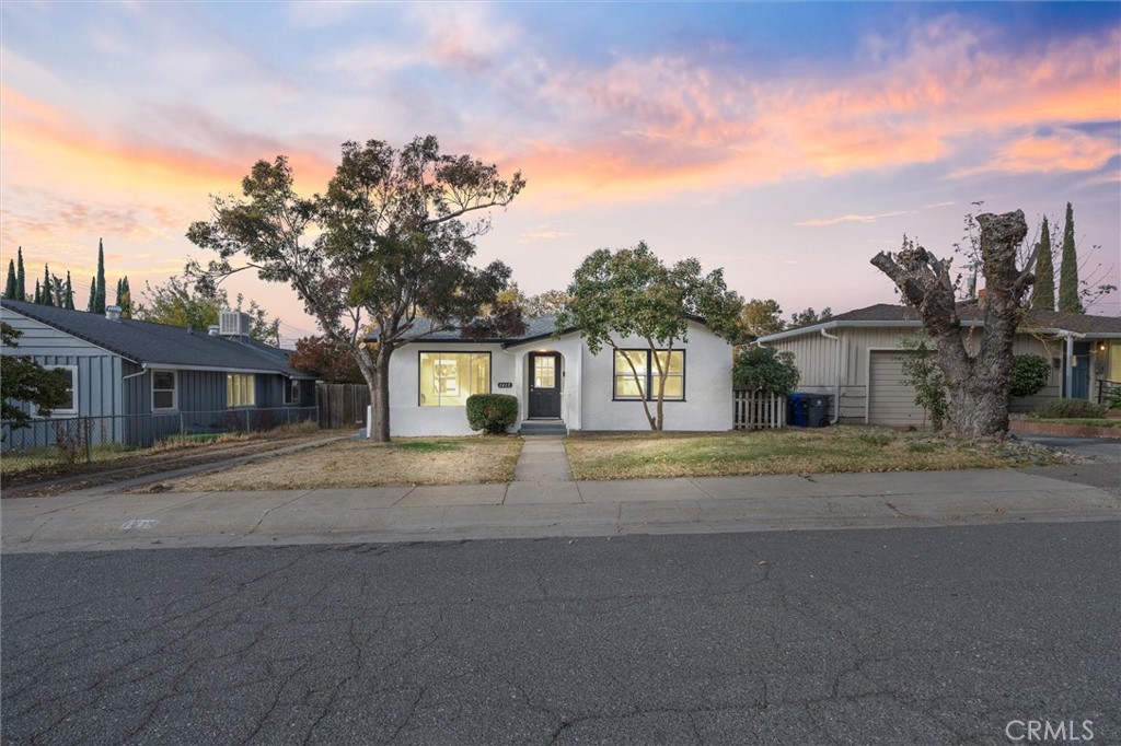 a view of a house with a street