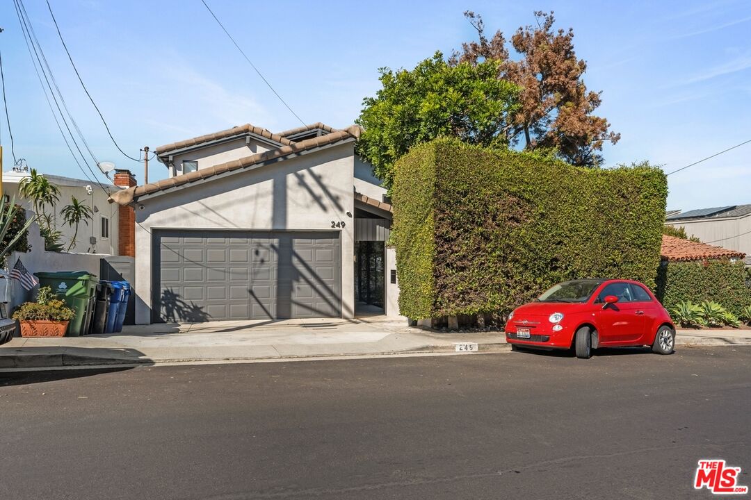 a car parked in front of a house