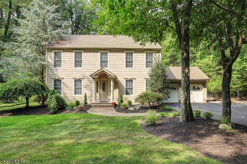 a view of a house with a yard porch and sitting area