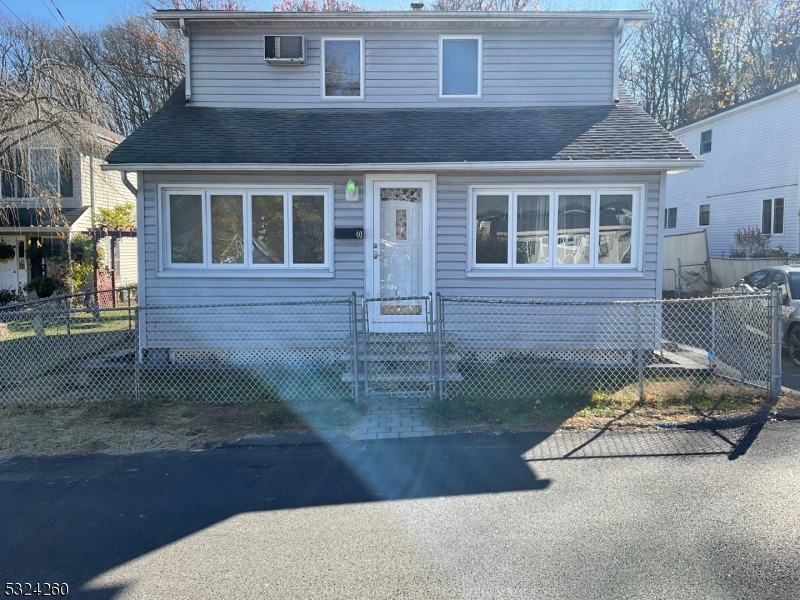 a front view of a house with entertaining space