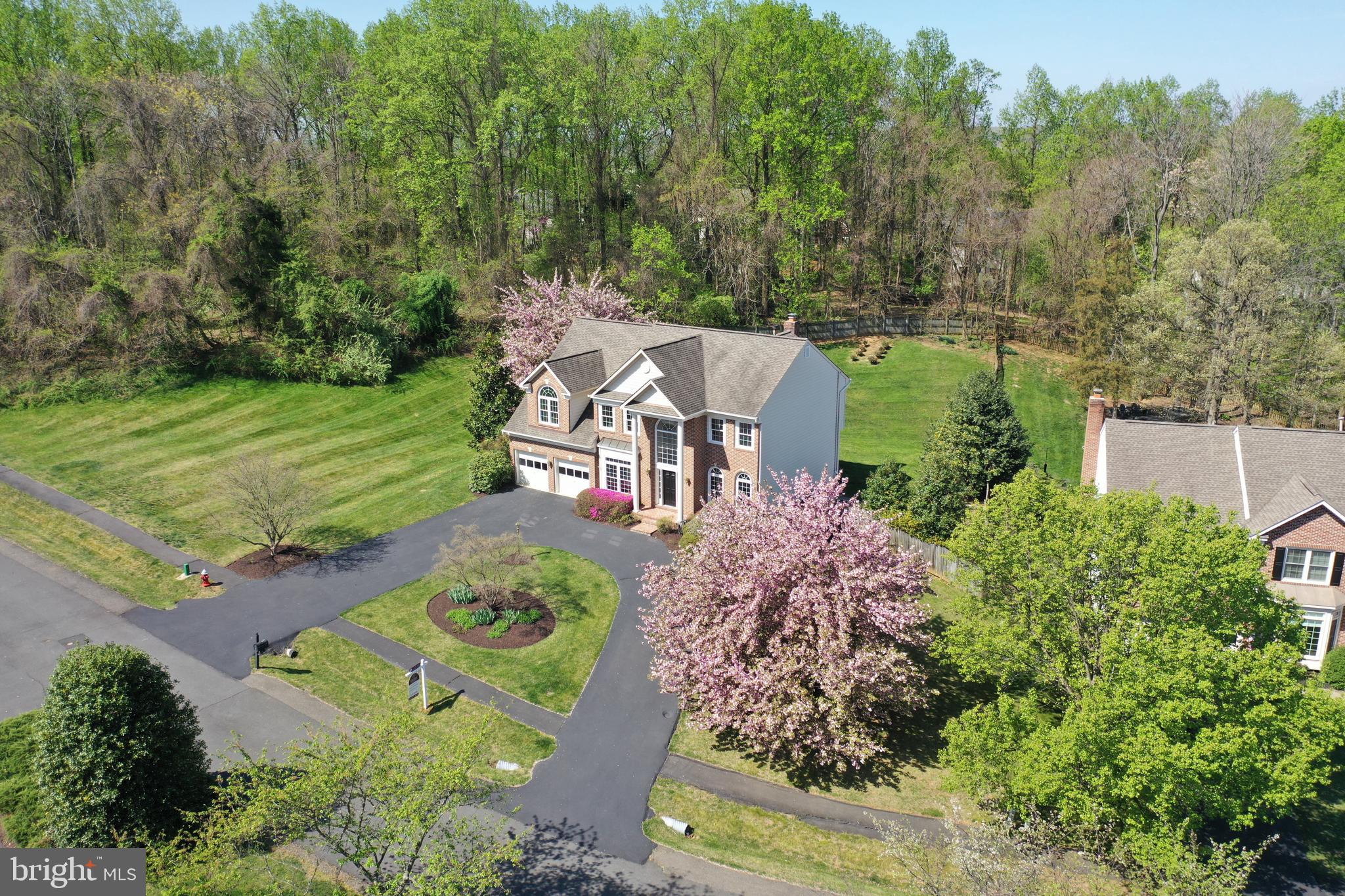 an aerial view of a house with a garden